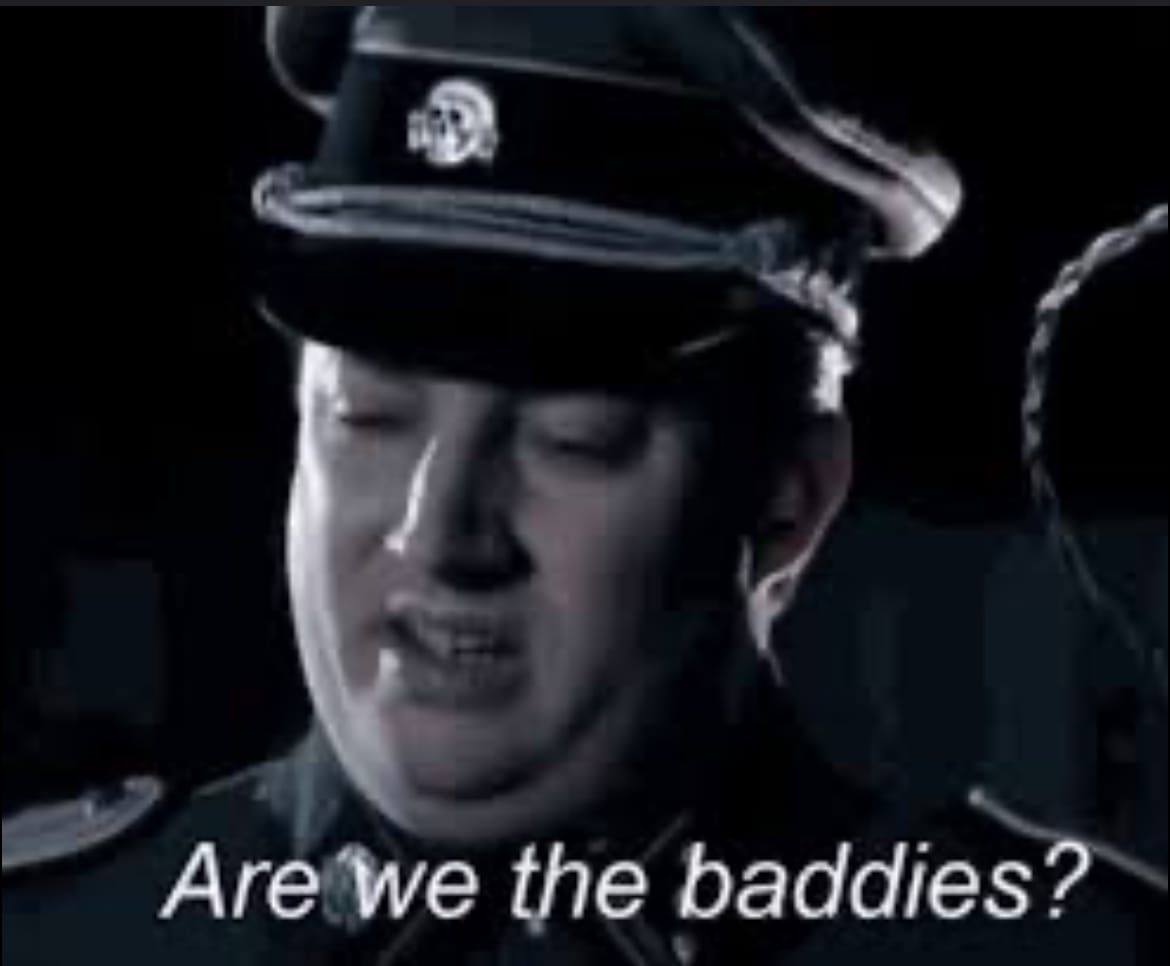 Meme of British Comedian David Mitchell in an SS officers uniform asking "Are we the baddies?"