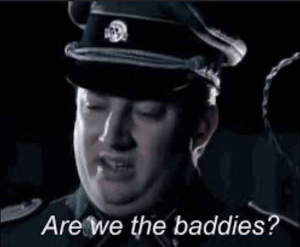 Meme of British Comedian David Mitchell in an SS officers uniform asking "Are we the baddies?"